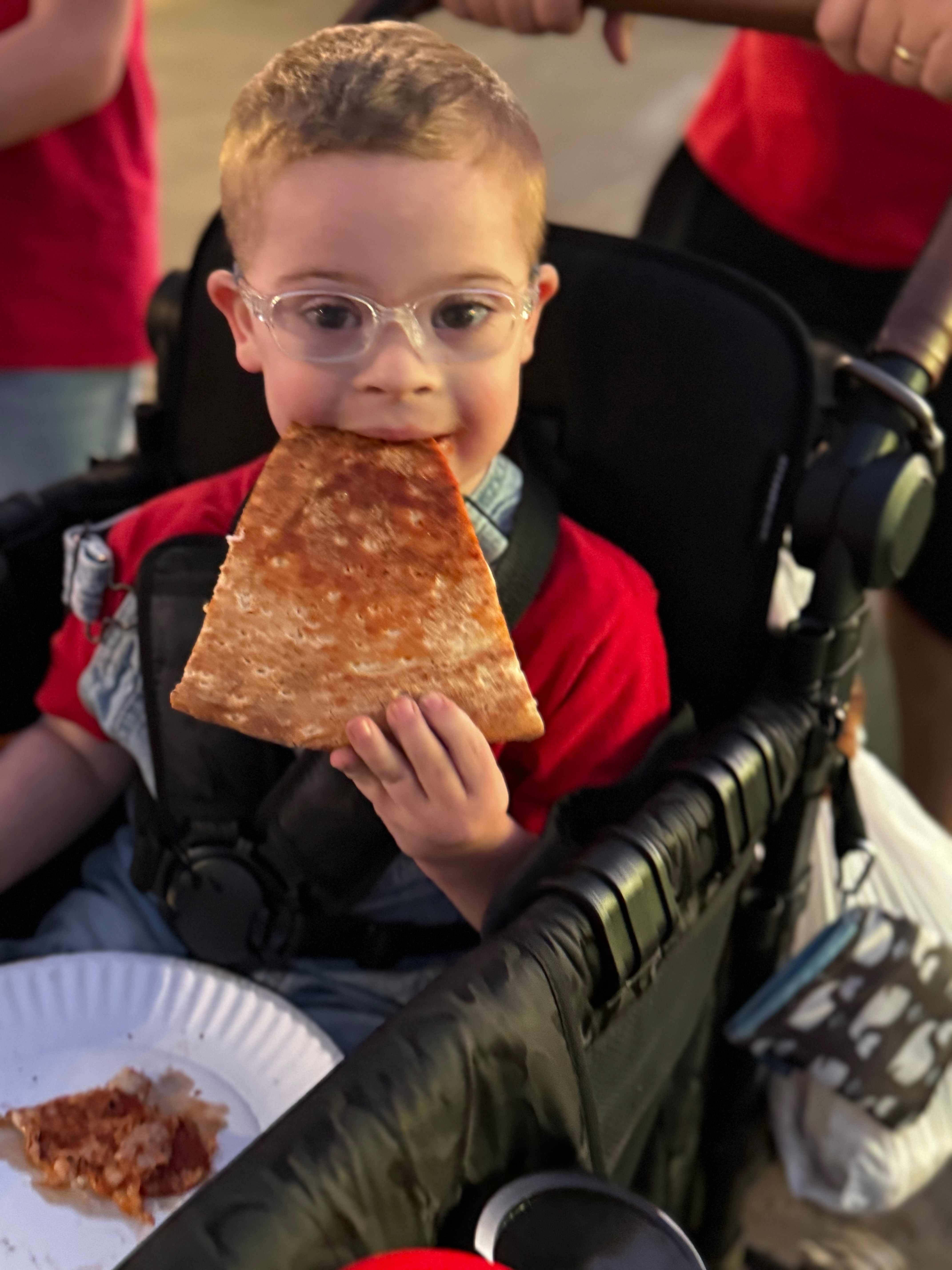 Charlie enjoying pizza
